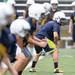 Saline High School football players line up during practice at the school on Monday, August 12, 2013. Melanie Maxwell | AnnArbor.com